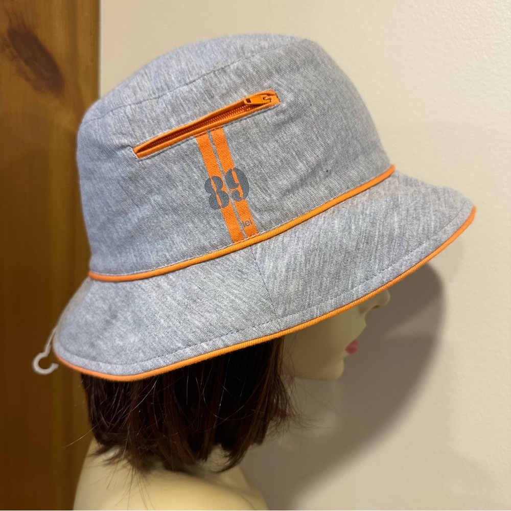 l.e.i. Gray and Orange floppy bucket hat with zipper pocket, 89. NWOTs